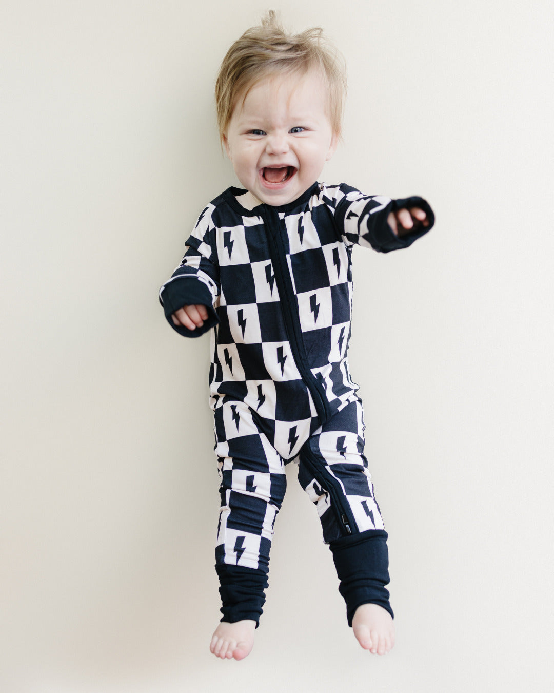 gender neutral baby bamboo zip up pajamas lightning bolts checkered kids zip up pj's