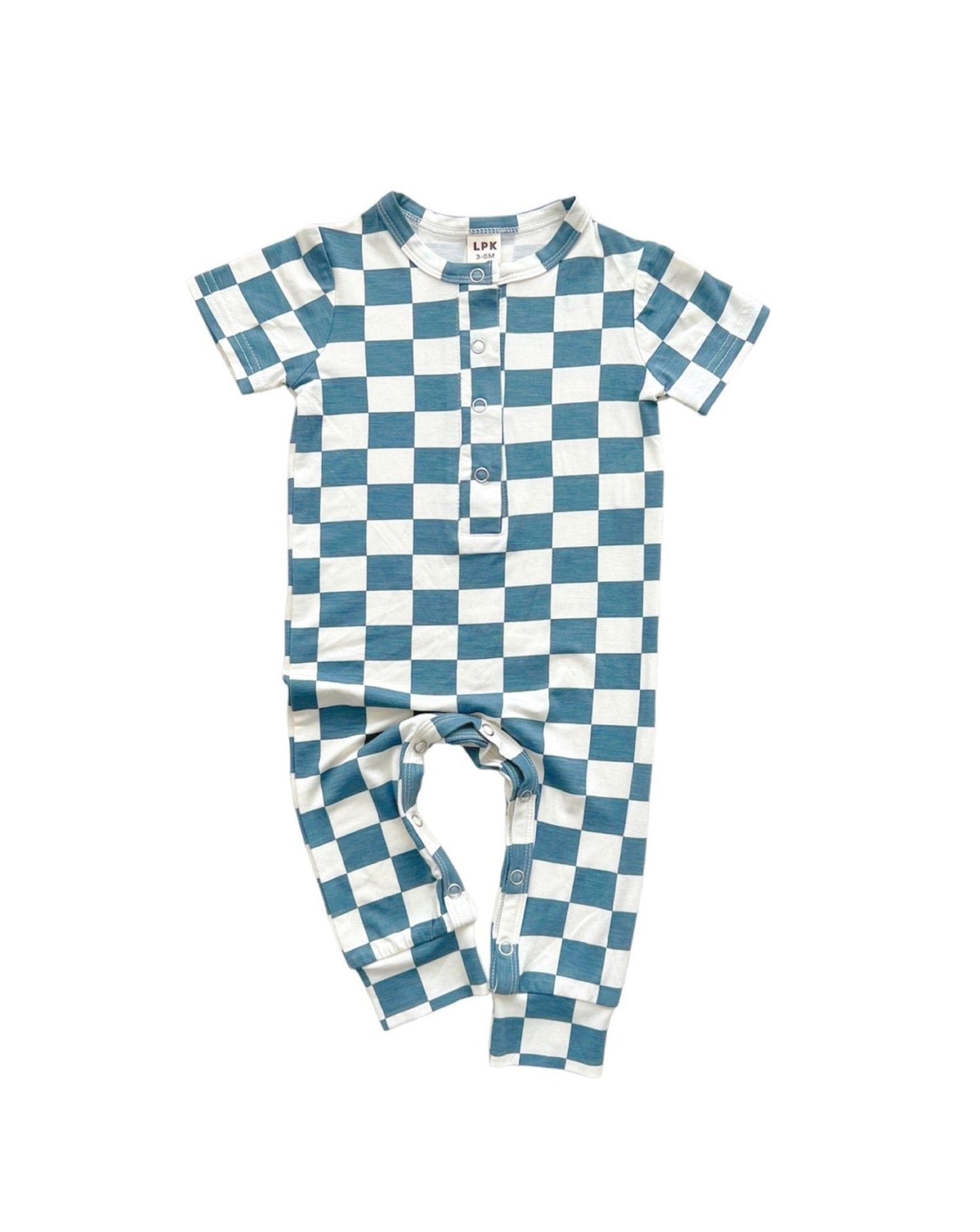 Blue and white checkered short sleeve bamboo jumsuit from Lucky Panda Kids laid out on a blank surface. Sold by MilkbabyCo