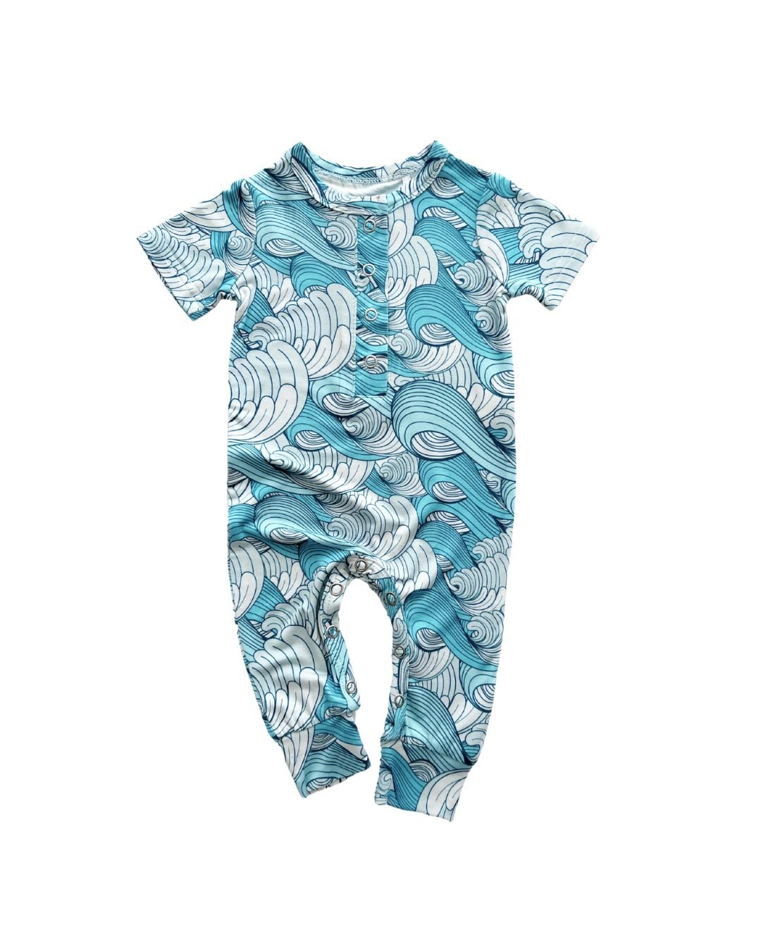 Lucky Panda Kids short sleeve romper in blue and white ocean waves design, laid out on a white background.