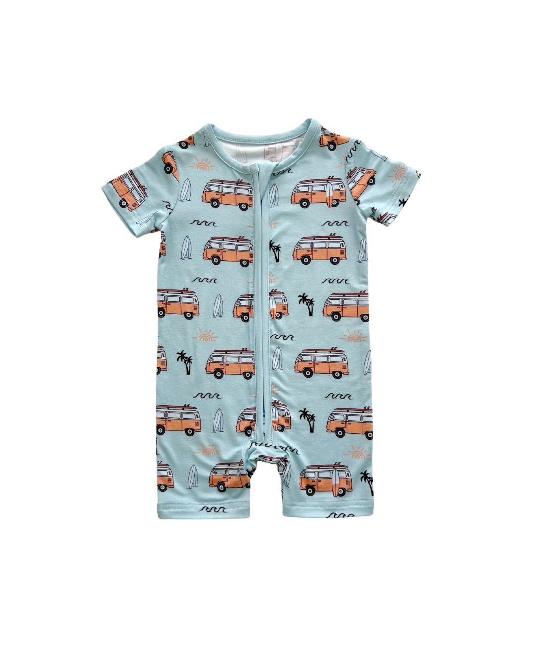 A Lucky Panda Kids blue bamboo short sleeved shortie romper with orange surf vans, white surfboards, palm trees and black wave designs. Laid out on a white background. 