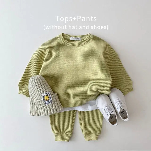 MilkBabyCo’s Cotton light sage green long sleeve ribbed sweater and matching pants set for infant babies and toddler in pink, perfect for autumn fall or winter fashion.