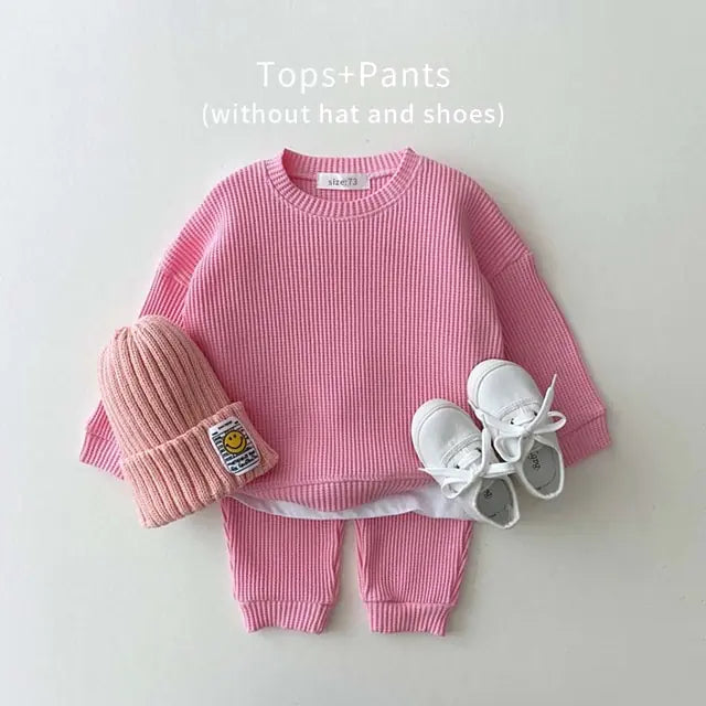 MilkBabyCo’s Cotton Pink long sleeve ribbed sweater and matching pants set for infant babies and toddler in pink, perfect for autumn fall or winter fashion.